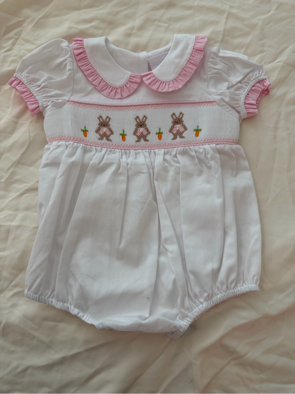 NWOT Stitchy Fish Smocked Bunny Romper in White and Pink